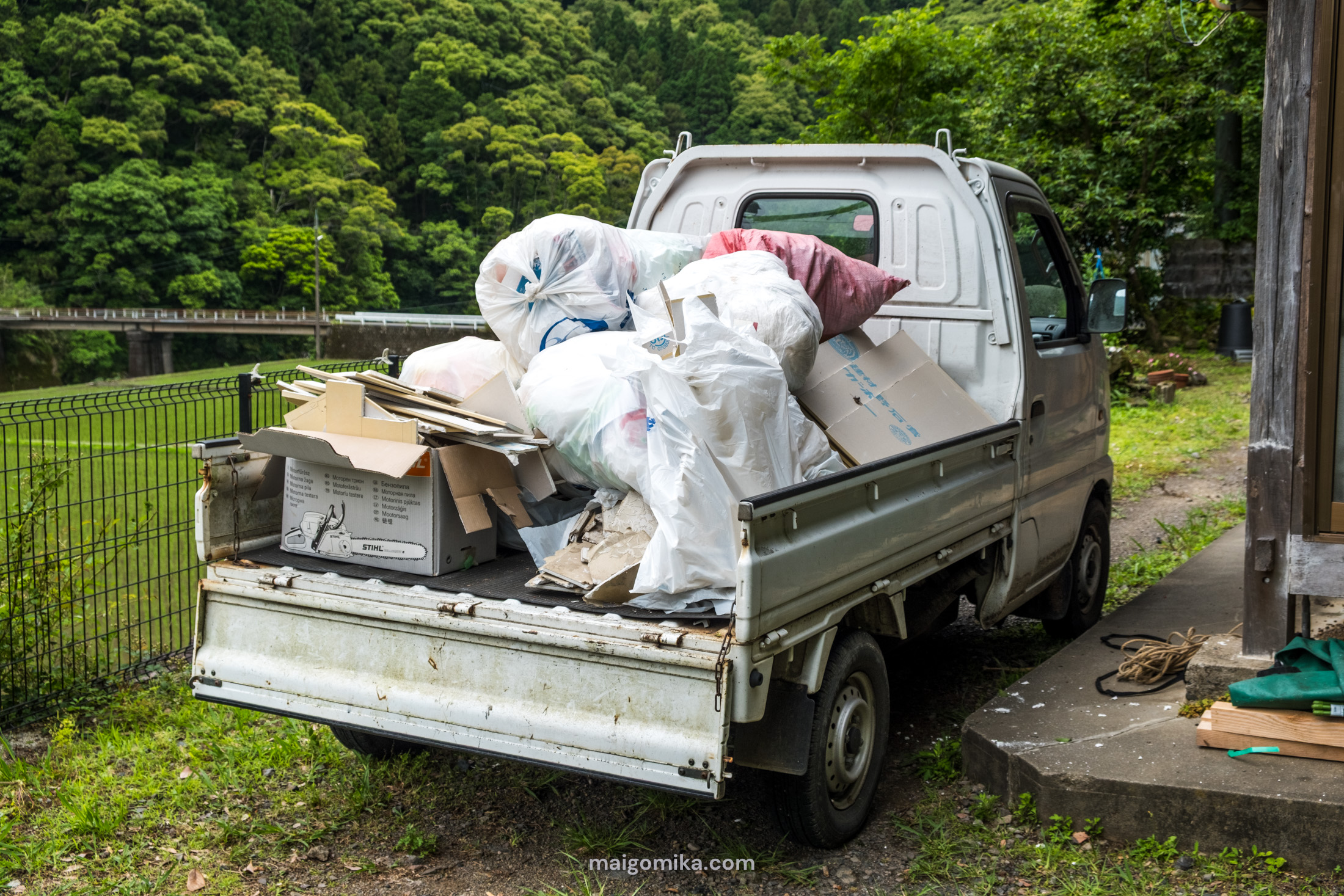 garbage on Japanese k truck prepared to go do the dump
